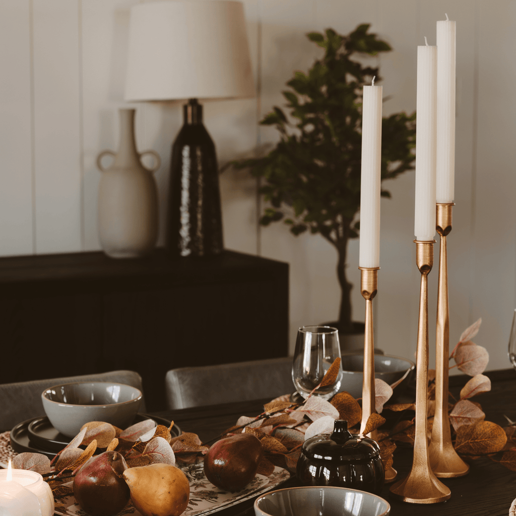 Gold Cast Iron Taper Candle Holders.