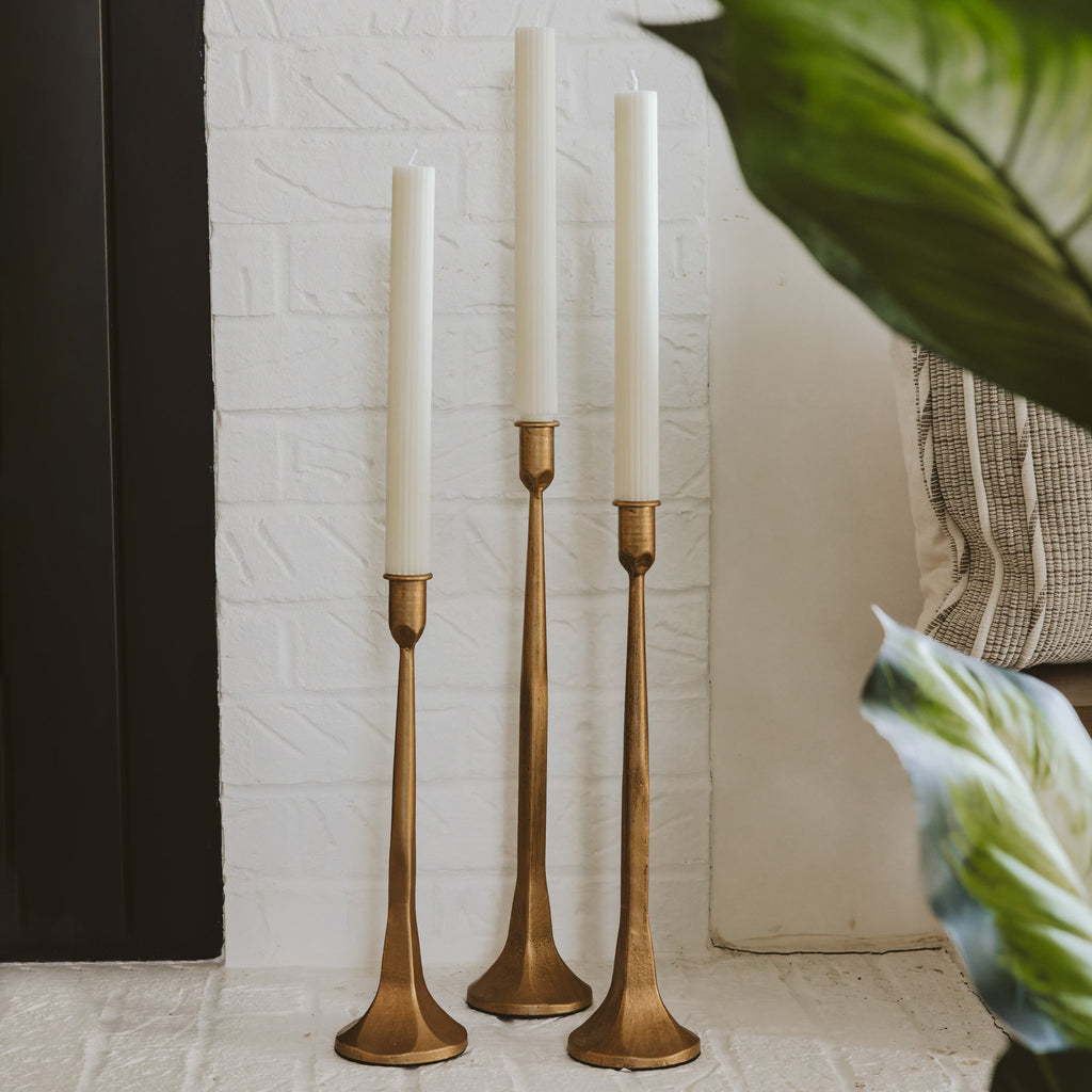 Gold Cast Iron Taper Candle Holders.