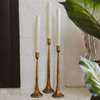 Gold Cast Iron Taper Candle Holders.
