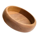 Wooden bowl on a white background