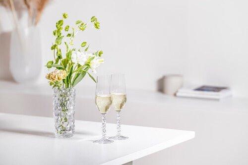 Orrefors Carat Champagne Flutes (8oz): Luminous Elegance by Lena Bergström at Resonant OrreforsSTEMWAREChampagne GlassesGLASSWARE