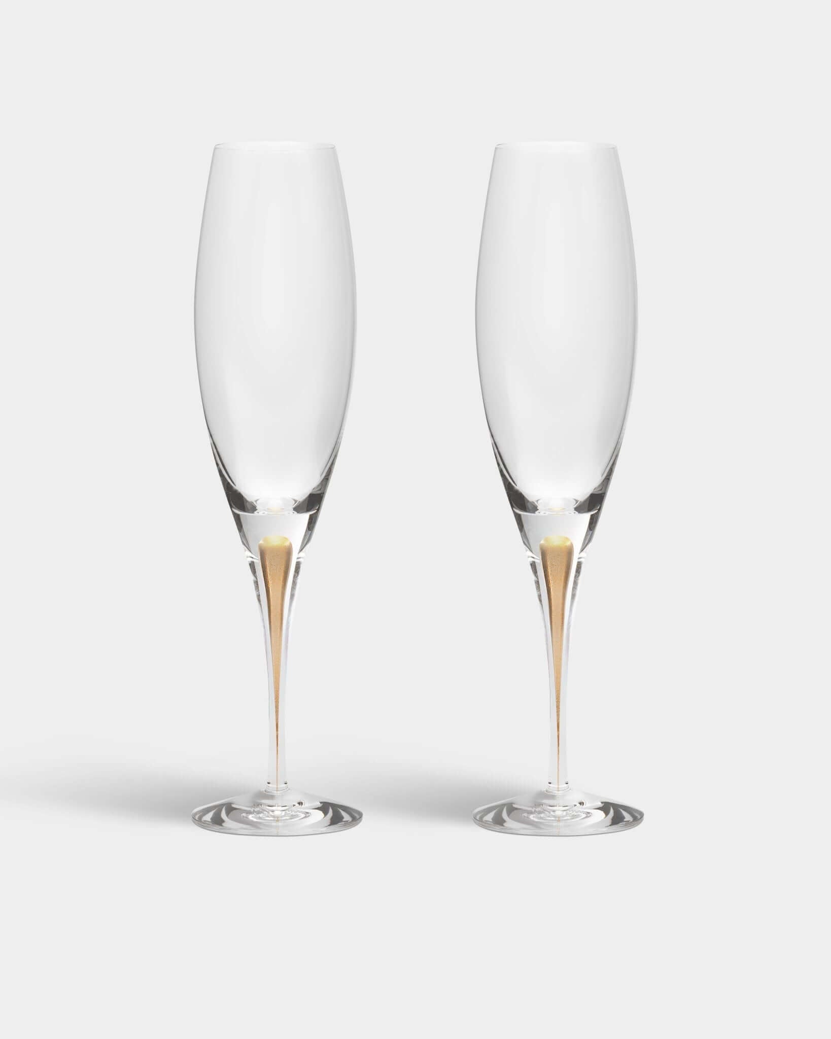 Orrefors Intermezzo Gold Champagne Flutes (7oz): Celebrate in Style - dwellandremainOrrefors