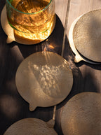 Stinson Antique Brass Coasters - Set of 6.